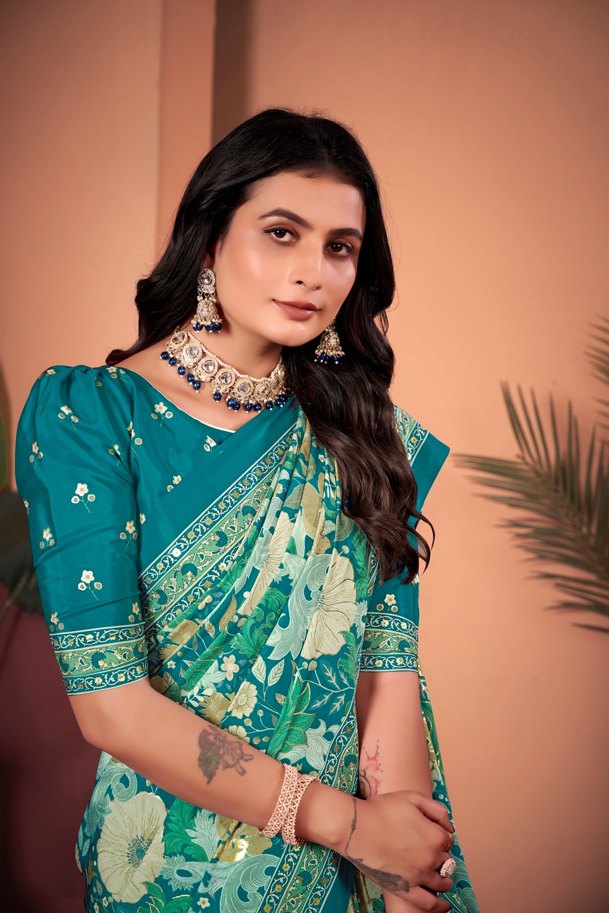Mesmerizing Turkish Blue Saree with Positional Floral Print & Foil-Embellished Pallu