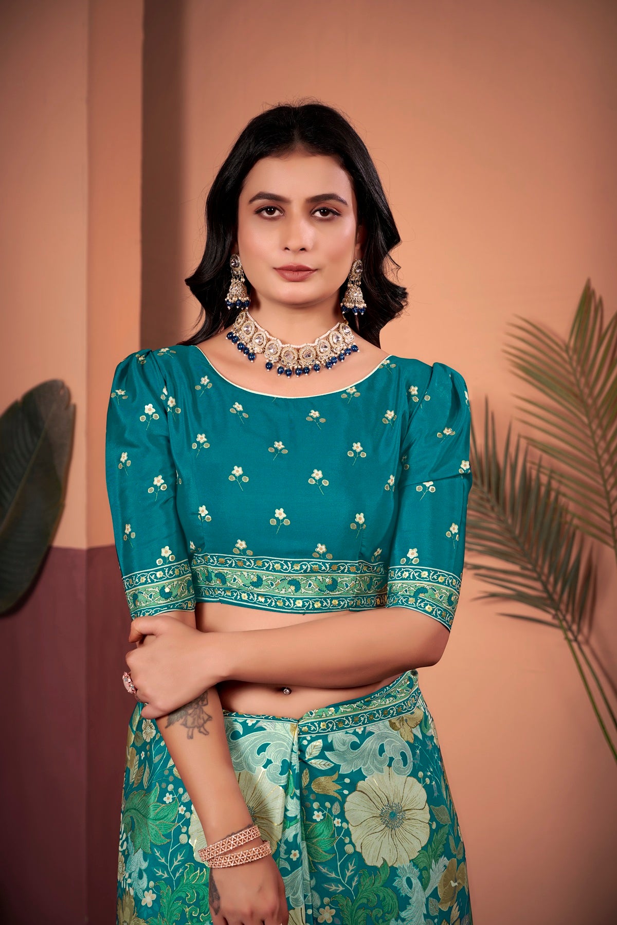 Mesmerizing Turkish Blue Saree with Positional Floral Print & Foil-Embellished Pallu