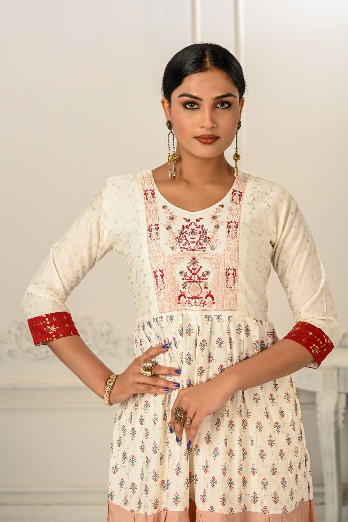 Enhance Your Style with Cotton Handprint Cream & Red Light Embroidery Kurtis - jivora