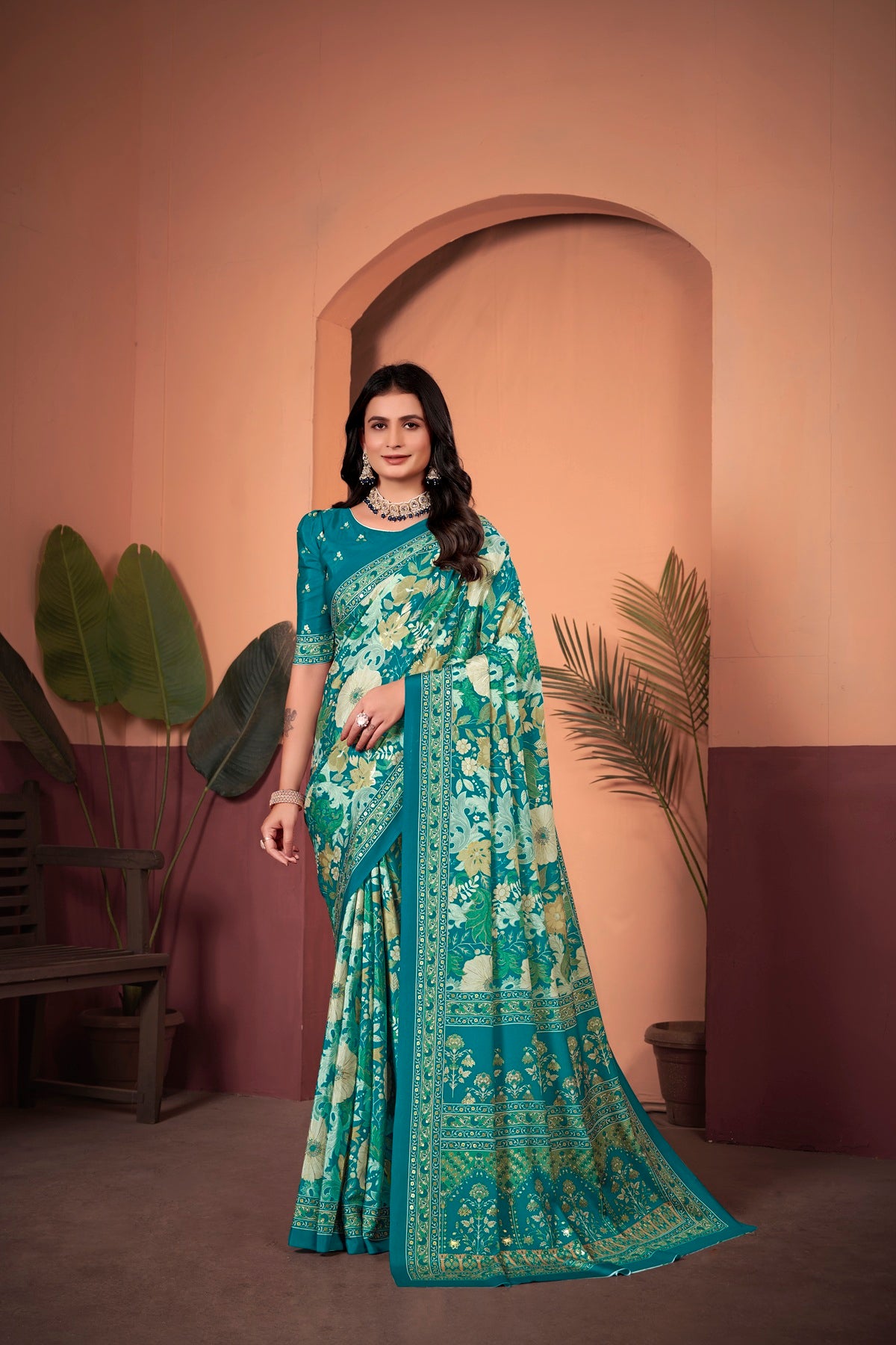 Mesmerizing Turkish Blue Saree with Positional Floral Print & Foil-Embellished Pallu