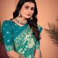 Mesmerizing Turkish Blue Saree with Positional Floral Print & Foil-Embellished Pallu