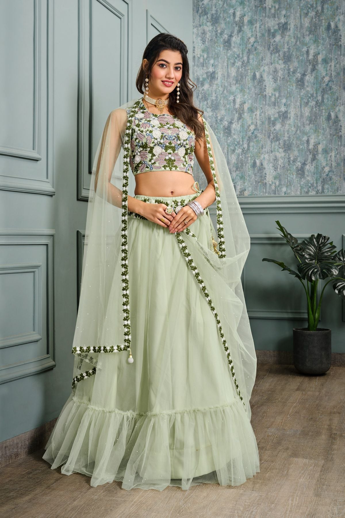 Pista Green Net Heavy Embroidery Lehenga - jivora