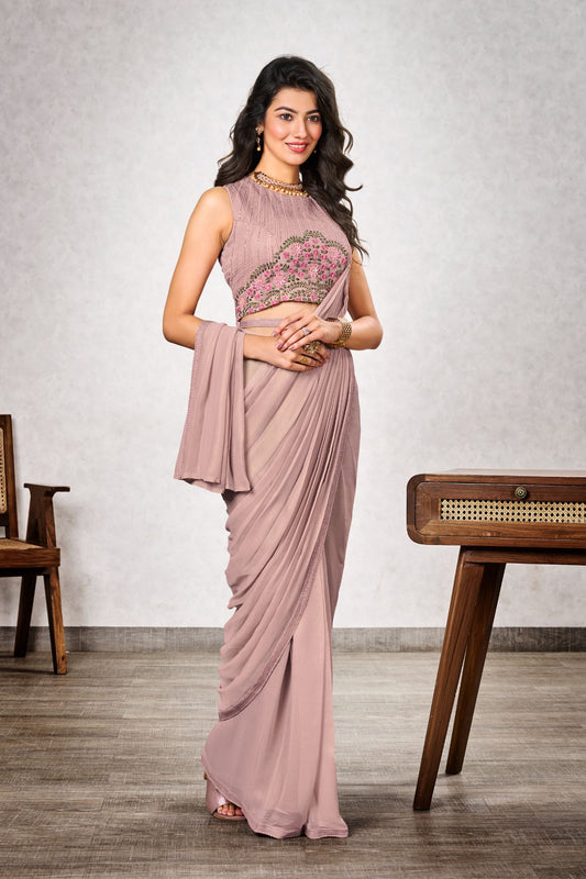 Featuring light pink shimmer georgettes embroidery Saree - jivora